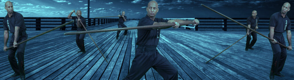 UKWCKFA teacher and London Wing Chun Academy Master Mark Philips demonstrates various techniques from the Wing Chun pole. Composite on waterfront pier.
