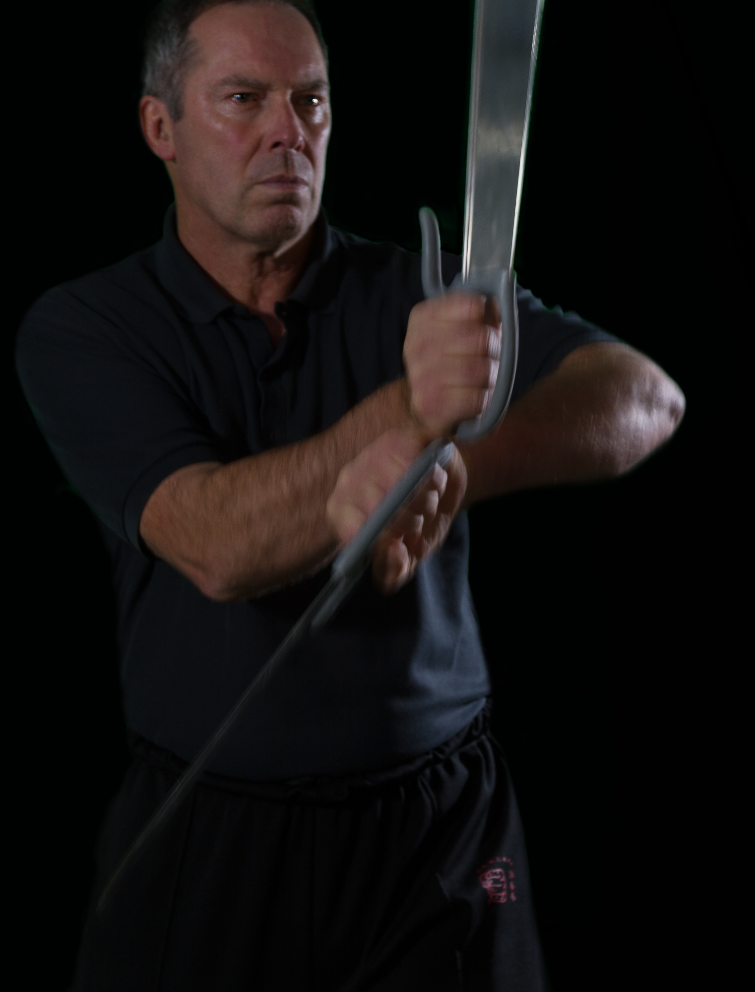 James Sinclar founder and Chief Instructor of the prestigious UK Wing Chun Kung Fu Assoc. demonstrating the bart Chaam Do or Eight Cutting Knives.