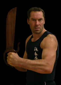 James Sinclar founder and Chief Instructor of the prestigious UK Wing Chun Kung Fu Assoc. demonstrating the bart Chaam Do or Eight Cutting Knives.
