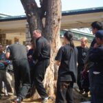 James Sinclair teaching in Hong Kong to a large outdoor audience at the 2nd World VTAA Conference. He was assisted by Master Mark Phillips of the London Wing Chun Academy. 2005. James was teaching ideas when you can't retreat.