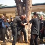 James Sinclair teaching in Hong Kong to a large outdoor audience at the 2nd World VTAA Conference. He was assisted by Master Mark Phillips of the London Wing Chun Academy. 2005. James was teaching ideas when you cant retreat.