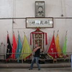 James Sinclair poses Bon Sau in the Ching Woo school Foshan, China 2005