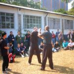 James Sinclair teaching in Hong Kong to a large outdoor audience at the 2nd World VTAA Conference. He was assisted by Master Mark Phillips of the London Wing Chun Academy. 2005.