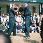 James Sinclair teaching in Hong Kong to a large outdoor audience at the 2nd World VTAA Conference. He was assisted by Master Mark Phillips of the London Wing Chun Academy. 2005.