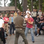 Master Mark Phillips with Master Nick Martin demonstrating for Si Gung Ip Chun in Foshan China