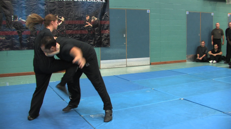 UK Wing Chun Assoc. 25th Anniversary. Poppy Young uses a knes strike to great effect.